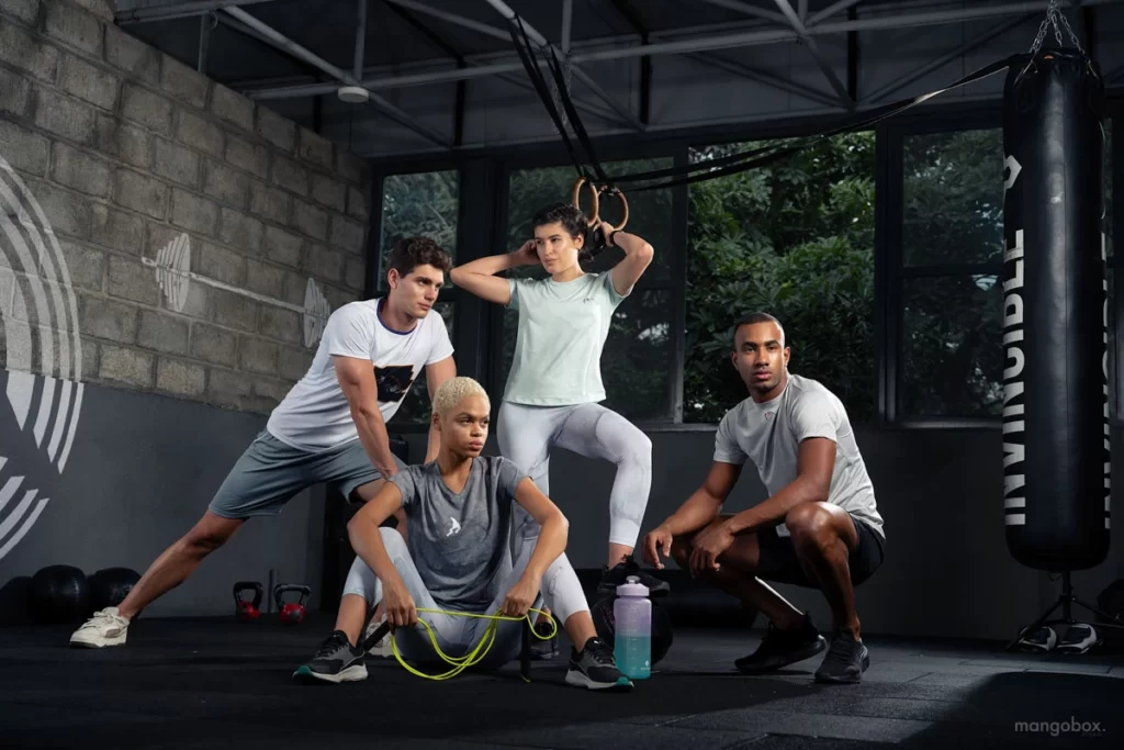 gymwear clothes models posing together creative ad photoshoot